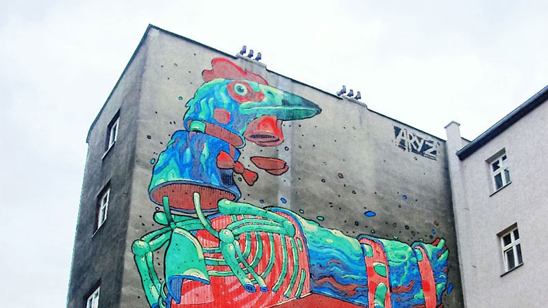 Fragment muralu na budynku przy ul. Tylna Mariacka 25